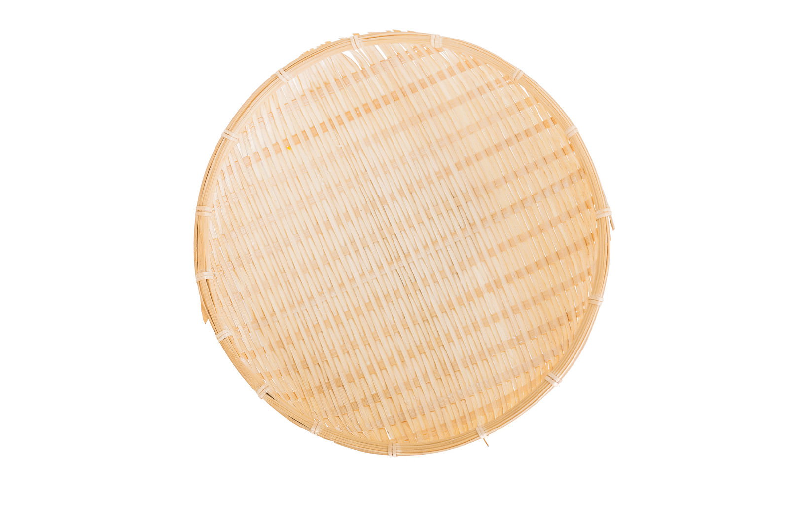 A round bamboo colander on a white background, top view