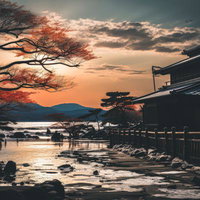 川辺に佇む和風の長屋と夜明けの朝焼け風景の写真