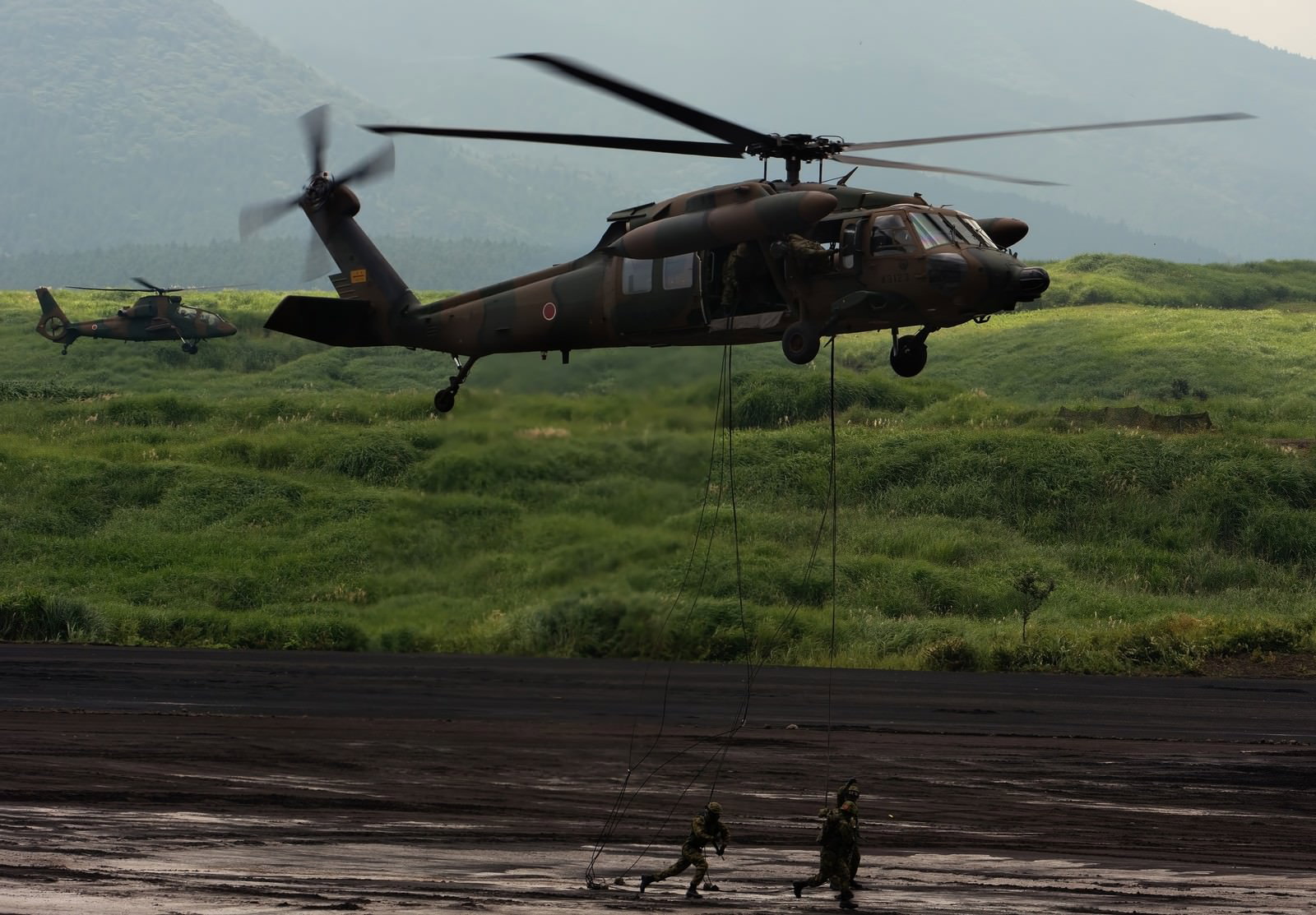 JGSDF Soldiers Rappelling from UH-60 Helicopter — Free Stock Photo ...