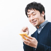 油揚げとワイヤレスイヤホンでテンション揚げ揚げの写真