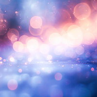 無数の光源が煌めく夢幻的な背景 ピンク紫青のグラデーション玉ボケの写真