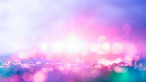 ピンク紫に煌めく光の粒が広がる色彩背景グラデーション