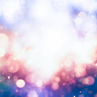 カラフルな光の粒が溢れる玉ボケの幻想世界の写真