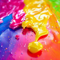 虹色に流れる鮮やかな絵の具とペイント、カラフルな液体混色の写真