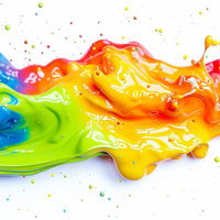 混ざり合うカラーインクと浮遊する光の粒の色彩の写真