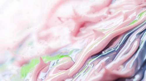 ピンクと青の塗料が流動する色彩表現の抽象アート背景