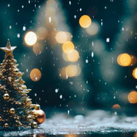 ゴールドに輝くクリスマスツリーと舞い散る雪の写真