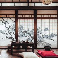 桜の襖絵が描かれた伝統的な和室空間と座卓の写真