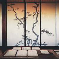 木枠に囲まれた松の襖絵がある和室の座敷空間の写真