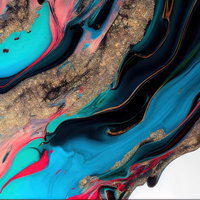 画用紙の上で流動する色彩豊かなインクのマーブル模様の写真