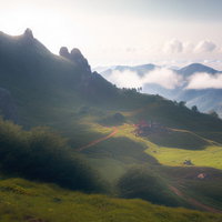 山麓に広がる草原と朝靄の高原風景、朝日に照らされた谷間の写真