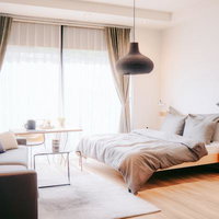 朝日が差し込むベッドルーム（一人暮らし）の写真