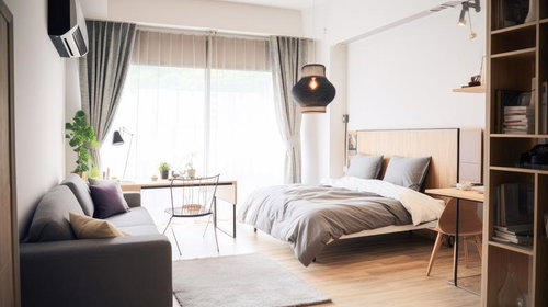 朝日を浴びる居心地の良いベッドルームと開放的なワンルーム