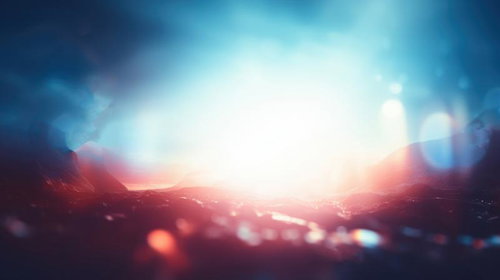 山並み越しの朝日とレンズフレアのライトリーク