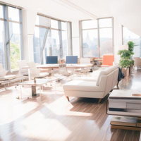 高層階からの眺望を備えた透明感のあるオシャレなコワーキングスペースの写真