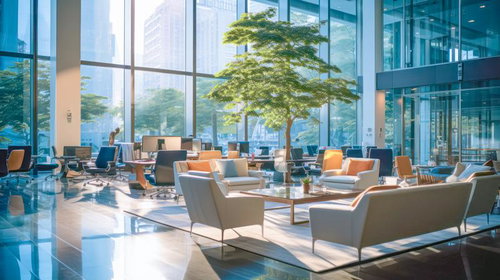 高層ビルを臨む大きな窓のあるオフィスラウンジ