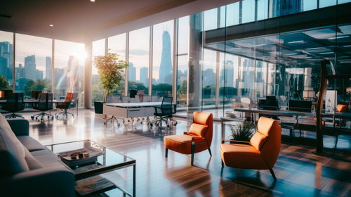 黄昏時に輝くガラス張りのモダンオフィスと都市風景