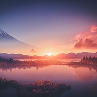 爆焼けの湖畔と雪山の夕景の写真