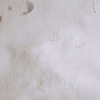 シミと汚れが付着した古びたクロスのテクスチャーの写真