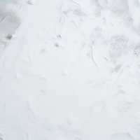 凸凹とシミがあるクロスの壁面テクスチャー背景の写真