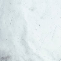 細かいキズと毛羽立ちがついた凸凹したテクスチャー壁の写真