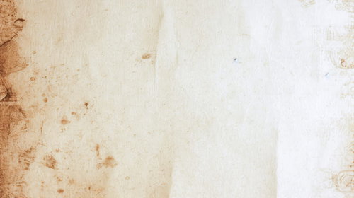 色あせた古紙に浮かぶカビと染みのテクスチャー