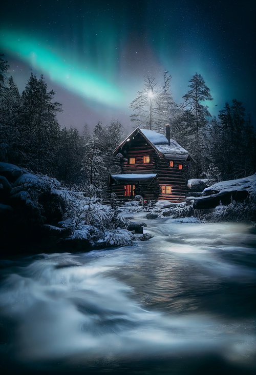 オーロラの夜空とログハウスのコテージ