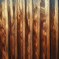 縦方向に並ぶ自然な木目の板テクスチャーの写真