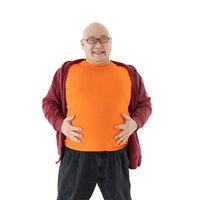 食べすぎて腹が出ちゃったなぁーと笑う男性の写真