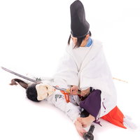 狐巫女を仕留める陰陽師の写真