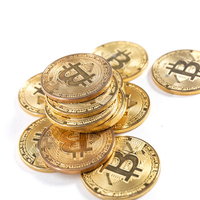 暗号資産（ビットコイン）の金貨を積み上げたコインの写真