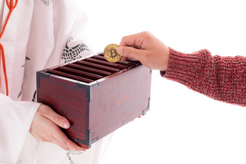賽銭箱に入れるビットコイン