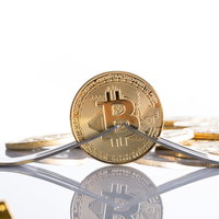 ビットコイン分裂（ハードフォーク）の金貨の写真