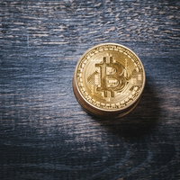 ビットコインの将来性を象徴する金色のコインの写真