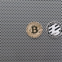 ゴールドとシルバーのビットコインとライトコインのメダルの写真