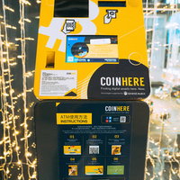 黄色い筐体の正面から見たビットコインATMの写真