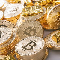 ビットコインバブルを象徴する金貨の山の写真