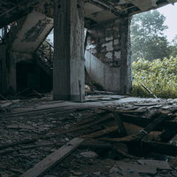 瓦礫にまみれたコンクリートの倒壊した建物の写真