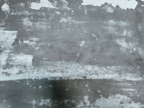 廃病院の塗装が剥がれたボロボロの壁のコンクリート