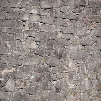 風雨で劣化した石垣のテクスチャーの写真