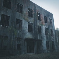 人気のない不気味な廃墟のコンクリート建物の写真