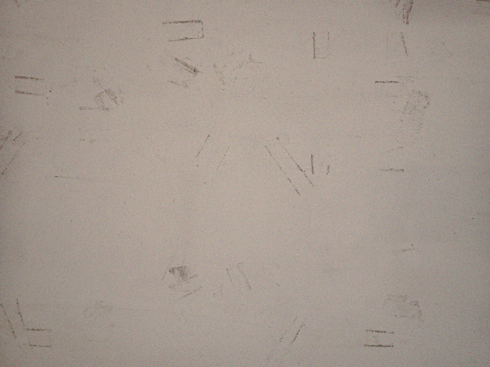 コンクリート調の床表面に細かな傷や汚れが付いたテクスチャー