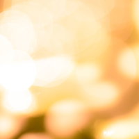 オレンジ色の光に包まれるイルミネーション背景の写真