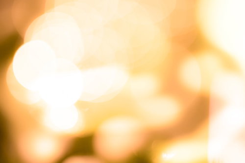 オレンジ色の光に包まれるイルミネーション背景