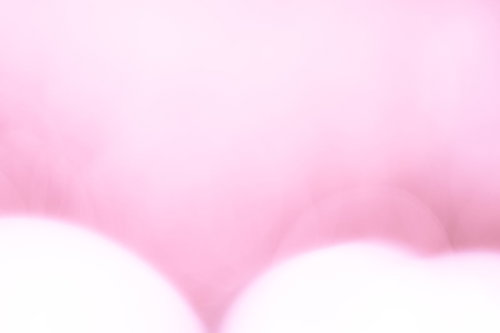 桃色の光に包まれるイルミネーション背景