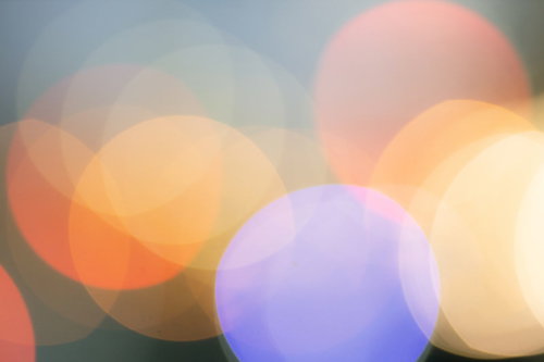 温かみのあるオレンジ色の丸ボケ背景テクスチャー