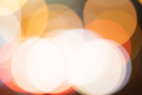 暖色のグラデーションが美しいオレンジ色の丸ボケ