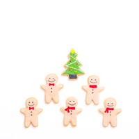 クリスマスツリーとニッコリ顔のアイシングクッキーの写真