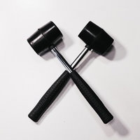 4000ハンマー、黒いダブハンが交差した作業工具の写真