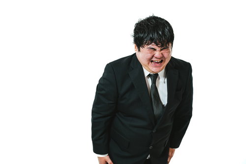 全力で謝罪する男性会社員のビジネス素材